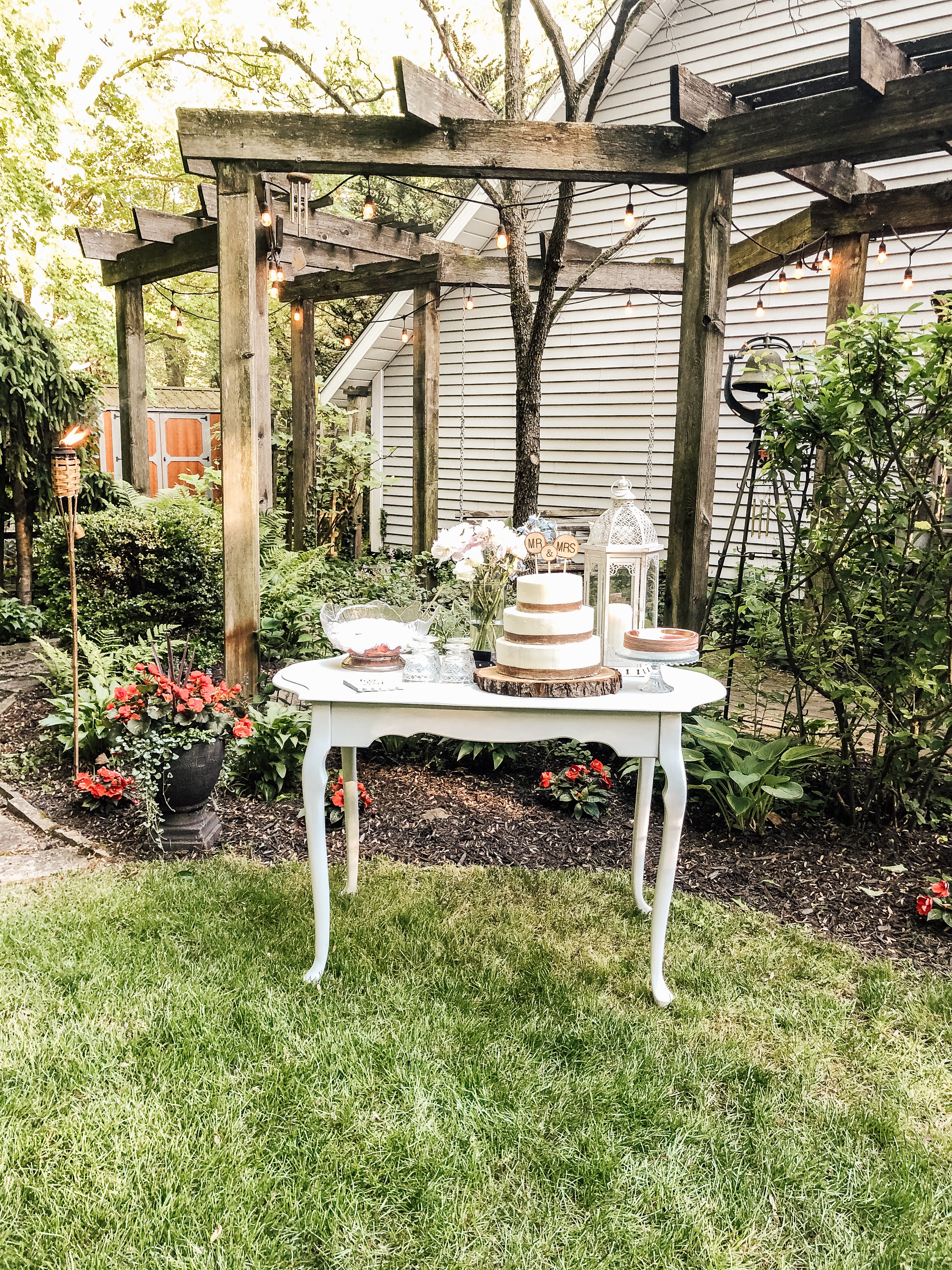 wedding cake table in the garden