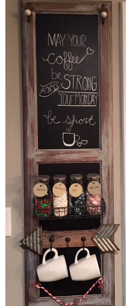 chalk board with coffee cups and hot cocoa toppings