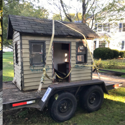 playhouse loaded on a trailer