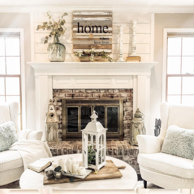 fireplace mantel with home sign