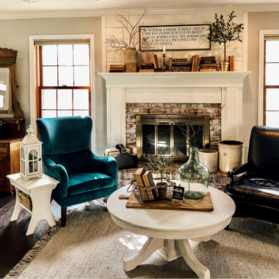 fireplace mantel and green chair