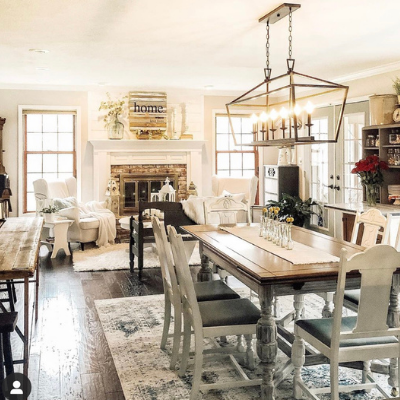 table and chairs and fireplace mantel