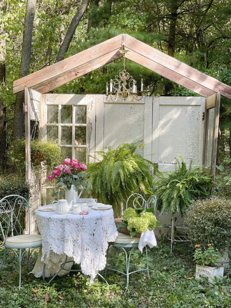 outdoor tea party with roses and lace