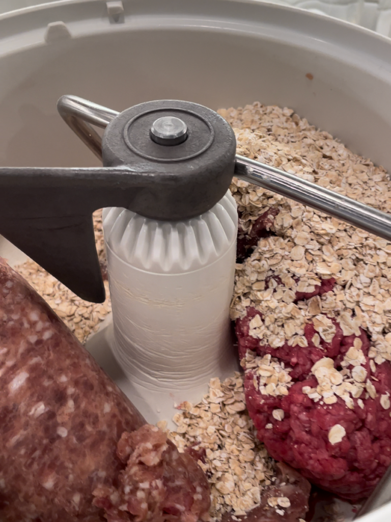 meat and oats in mixer