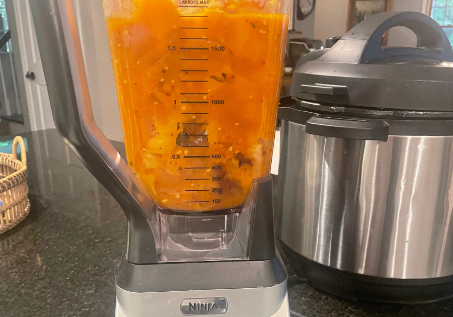 blender filled with soup 